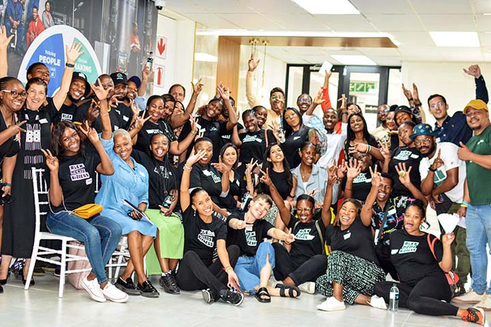 AlexBiz members celebrating at a network event